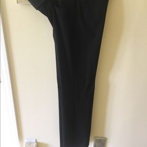 Bootcut, low rise waist, black dress pants.